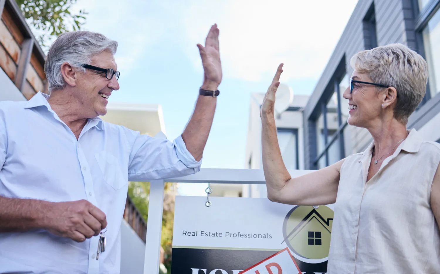 Pick Your Home & Lot A blurred image of a modern gym featuring exercise equipment like treadmills and elliptical machines with large windows for natural light.